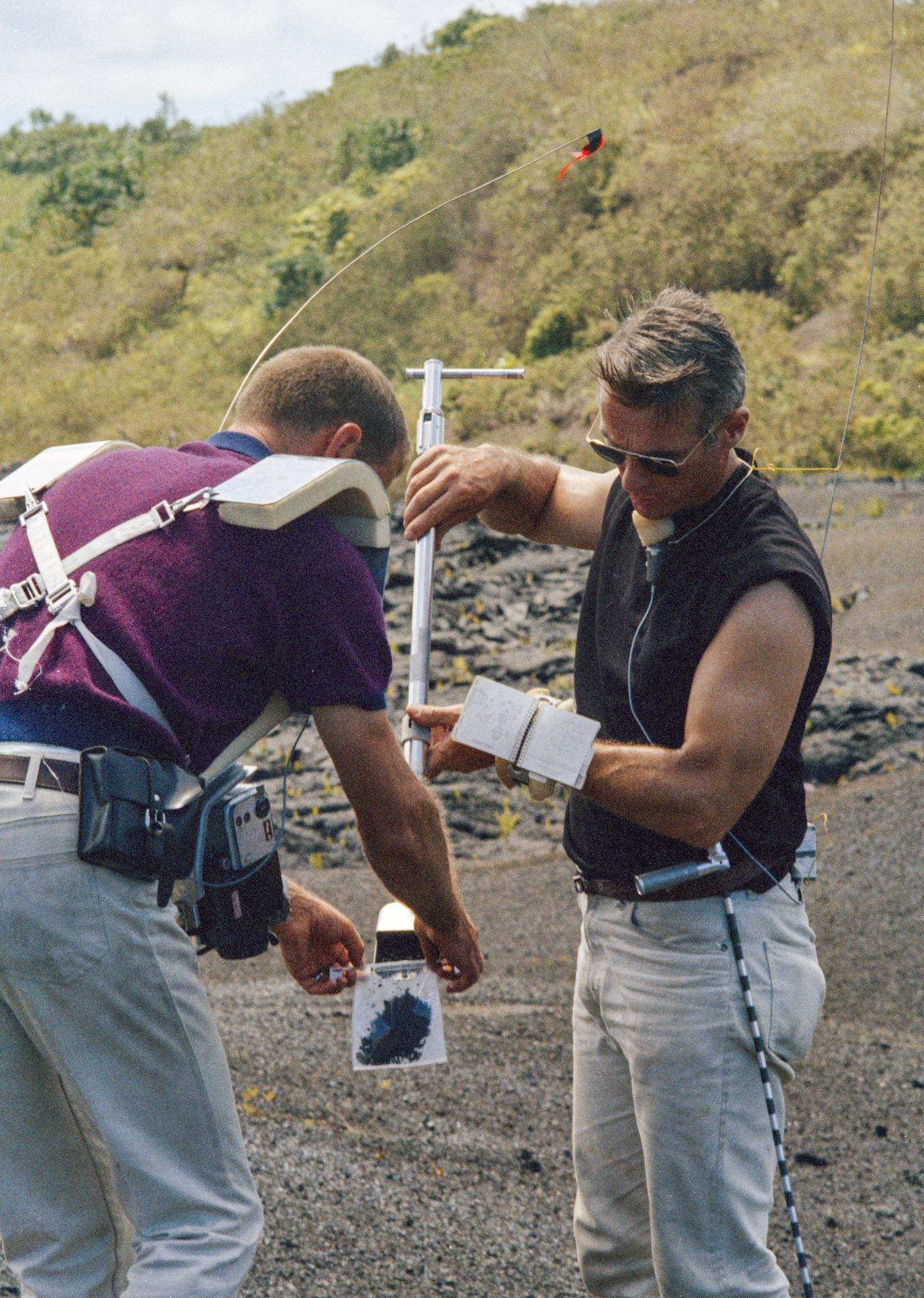 Astronaut Gene Cernan and Joe Engle train for a lunar EVA in Hawaii