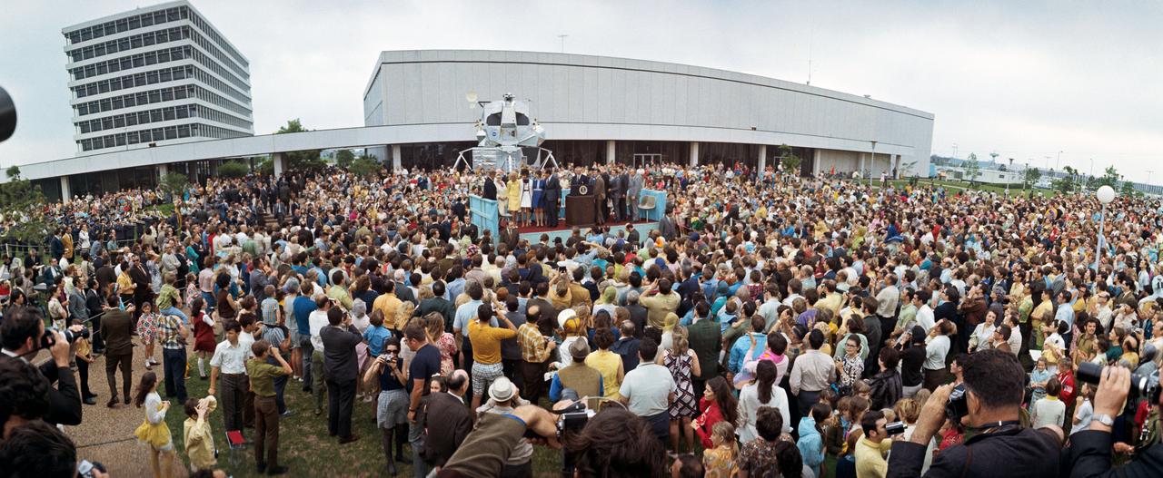 S70-35601 (18 April 1970) --- A wide-angle, overall view of the large crowd of people who were on hand to see President Richard M. Nixon present the Presidential Medal of Freedom to the Apollo 13 Mission Operations Team.  The honor is the nation's highest civilian award.  A temporary speaker's platform was erected beside Building 1 for the occasion.