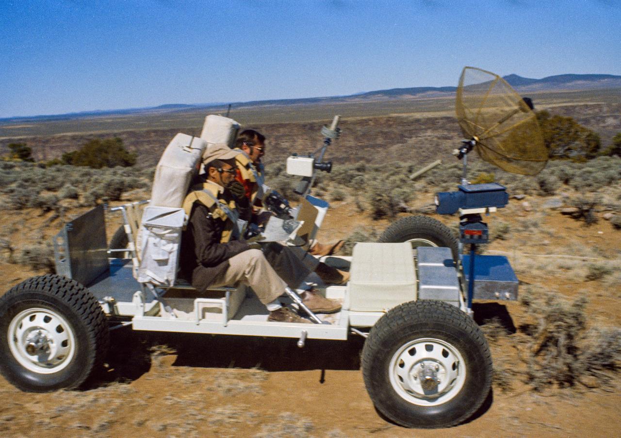 S71-24079 (1971) --- Astronauts Richard F. Gordon Jr., right, and Harrison H. Schmitt ? back-up crew members for the Apollo 15 lunar landing mission -- traverse in an Earth-bound training version of the Apollo Lunar Roving Vehicle (LRV or Rover) during geology training in Hawaii.  Photo credit: NASA  Note: There are elements of this description that have not been confimred. Please hold any release of descriptive information until such can be confirmed.