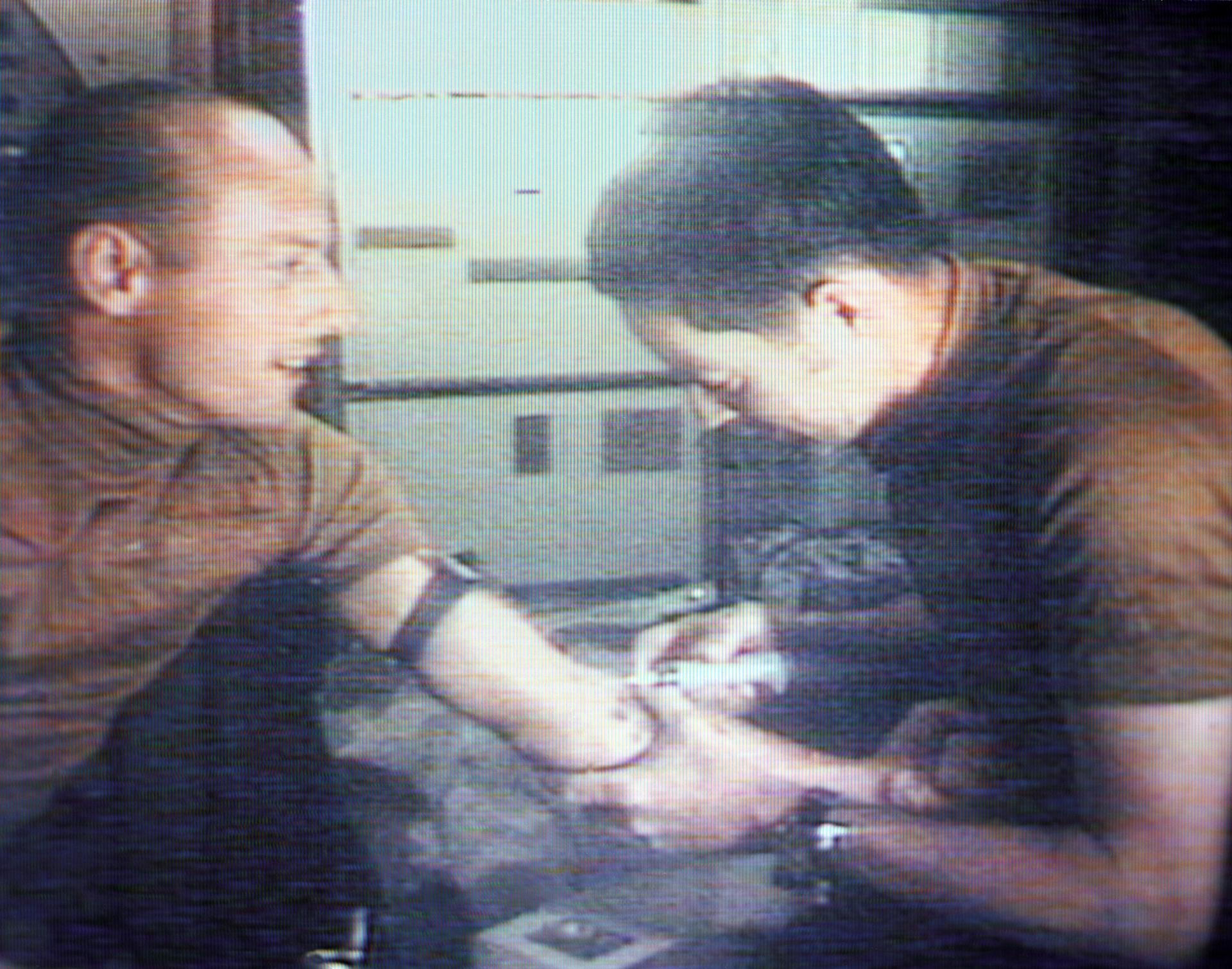 Joe Kerwin draws blood from Pete Conrad on board Skylab.