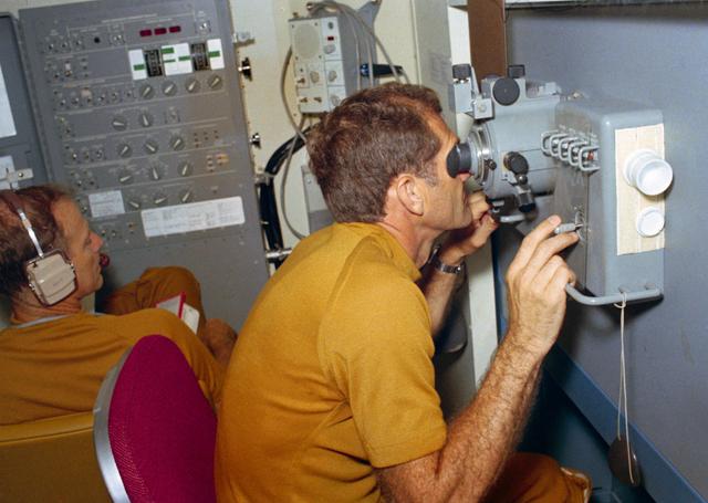 NASA image: Astronaut William Pogue using Skylab Viewfinder Tracking System experiment