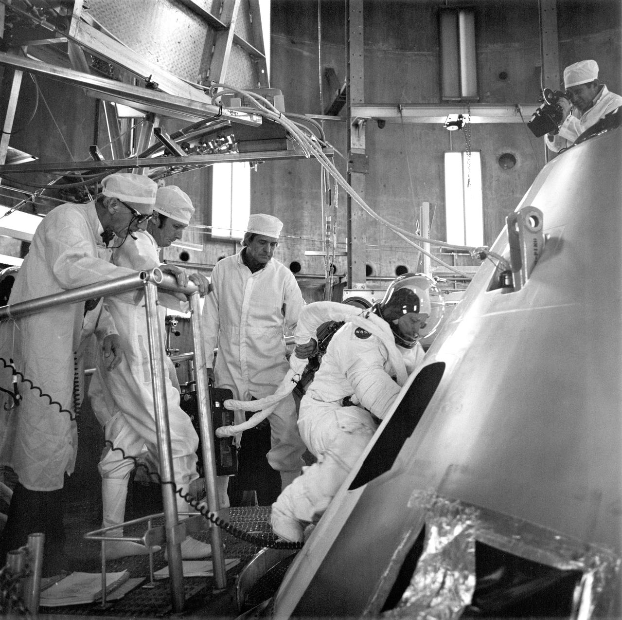 S73-34093 (6 Aug. 1973) --- Astronaut Gerald P. Carr, fully suited, Skylab 4 commander, prepares to enter spacecraft 118 (the Skylab 4 vehicle) at the start of a high altitude chamber test at the Kennedy Space Center (KSC). Also participating in the test were scientist-astronaut Edward G. Gibson, science pilot, and astronaut William R. Pogue, pilot. The Skylab 4 spacecraft is to be moved to the Vehicle Assembly Building (VAB) on Aug. 12, where it will be mated with the launch vehicle as a possible rescue craft for the Skylab 3 crewmen if needed. Photo credit: NASA