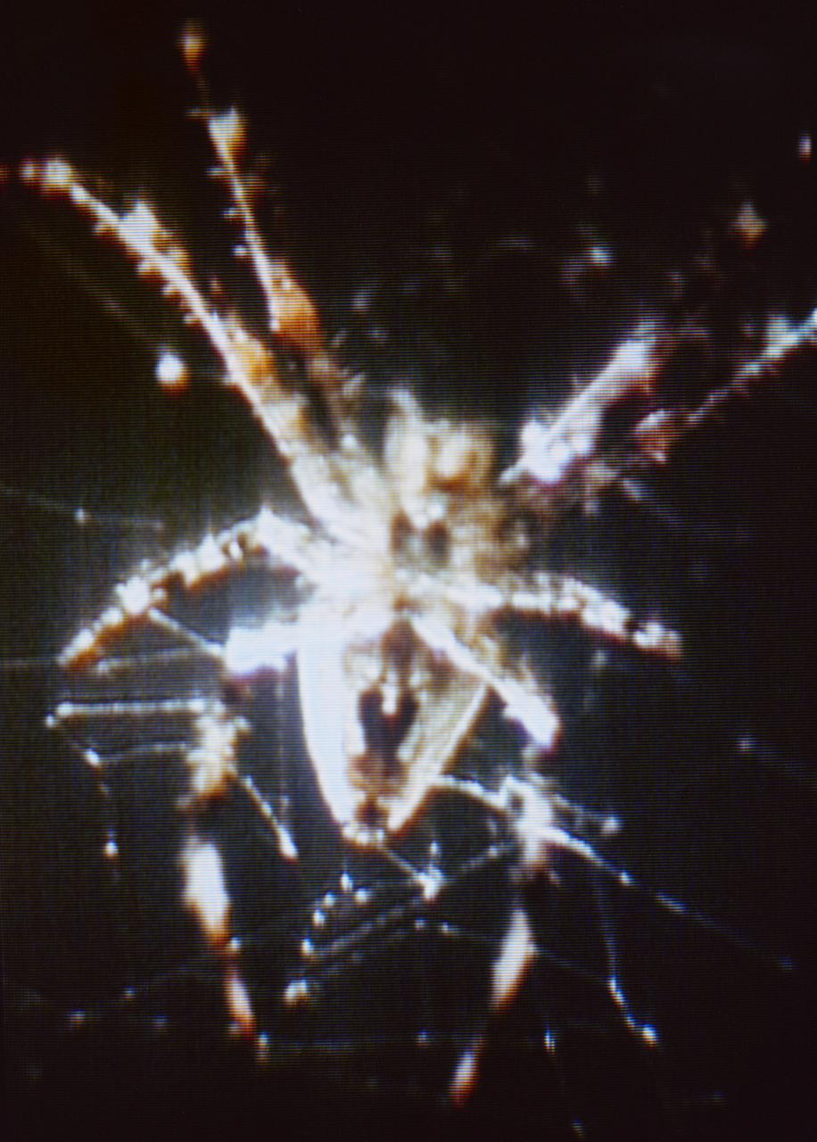 S73-34206 (8 Aug. 1973) --- A closeup view of Arabella, one of two Skylab 3 common cross spiders ?Araneus diadematus,? and the web it had spun in the zero-gravity of space aboard the Skylab space station cluster in Earth orbit. This is a photographic reproduction made a color television transmission aboard Skylab. During the 59-day Skylab 3 mission the two spiders, Arabella and Anita, were housed in an enclosure onto which a motion picture camera and a still camera were attached to record the spiders? attempts to build a web in the weightless environment. The spider experiment (ED52) was one of 25 experiments selected for Skylab by NASA from more than 3,400 experiment proposals submitted by 17-year-old Judith S. Miles of Lexington, Massachusetts. Anita died during the last week of the mission.    THIS PHOTOGRAPH IS A GOVERNMENT PUBLICATION ?NOT SUBJECT TO COPYRIGHT. It may not be used to state or imply the endorsement by NASA or by any NASA employee of a commercial product, process or service, or used in any way that might mislead. Accordingly, it is requested that if this photograph is used in advertising and other commercial promotions, layout and copy be submitted to NASA prior to release. Photo credit: NASA