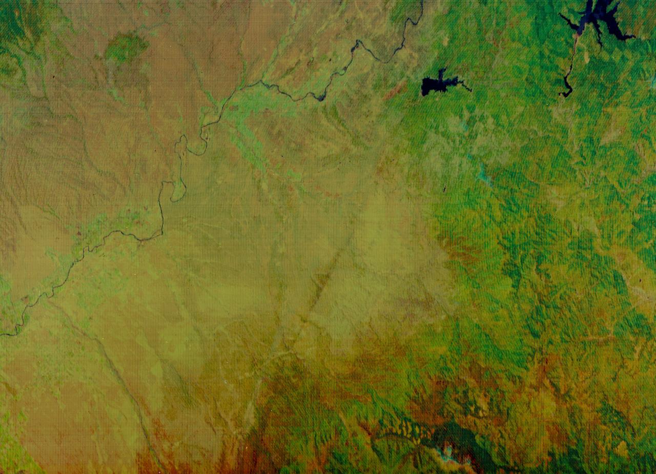 S73-34295B (June 1973) --- A vertical view of a portion of northern California reproduced from data taken from the Skylab Multispectral Scanner, experiment S192, in the Skylab space station in Earth orbit. This view is the most westerly one-third of Frame No. 001, Roll No. 518, S192, Skylab 2. Frame No. 001 extends from the Pacific coast at the Eureka area southeasterly 175 nautical miles to the Feather River drainage basin. Included in this view are Lake Shasta, Sacramento River Valley, Redding and Red Bluff. This non-photographic image is a color composite of channels 2 (visible), 7, and 12 (infrared) from the Earth Resources Experiments Package (EREP) S192 scanner. The scanner techniques assist with spectral signature identification and mapping of ground truth targets in agriculture, forestry, geology, hydrology and oceanography. Photo credit: NASA