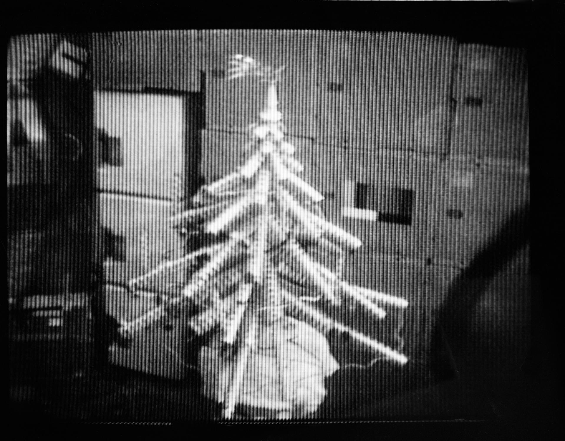A "Christmas tree" created out of food cans by the three crewmen of the Skylab 4 mission.