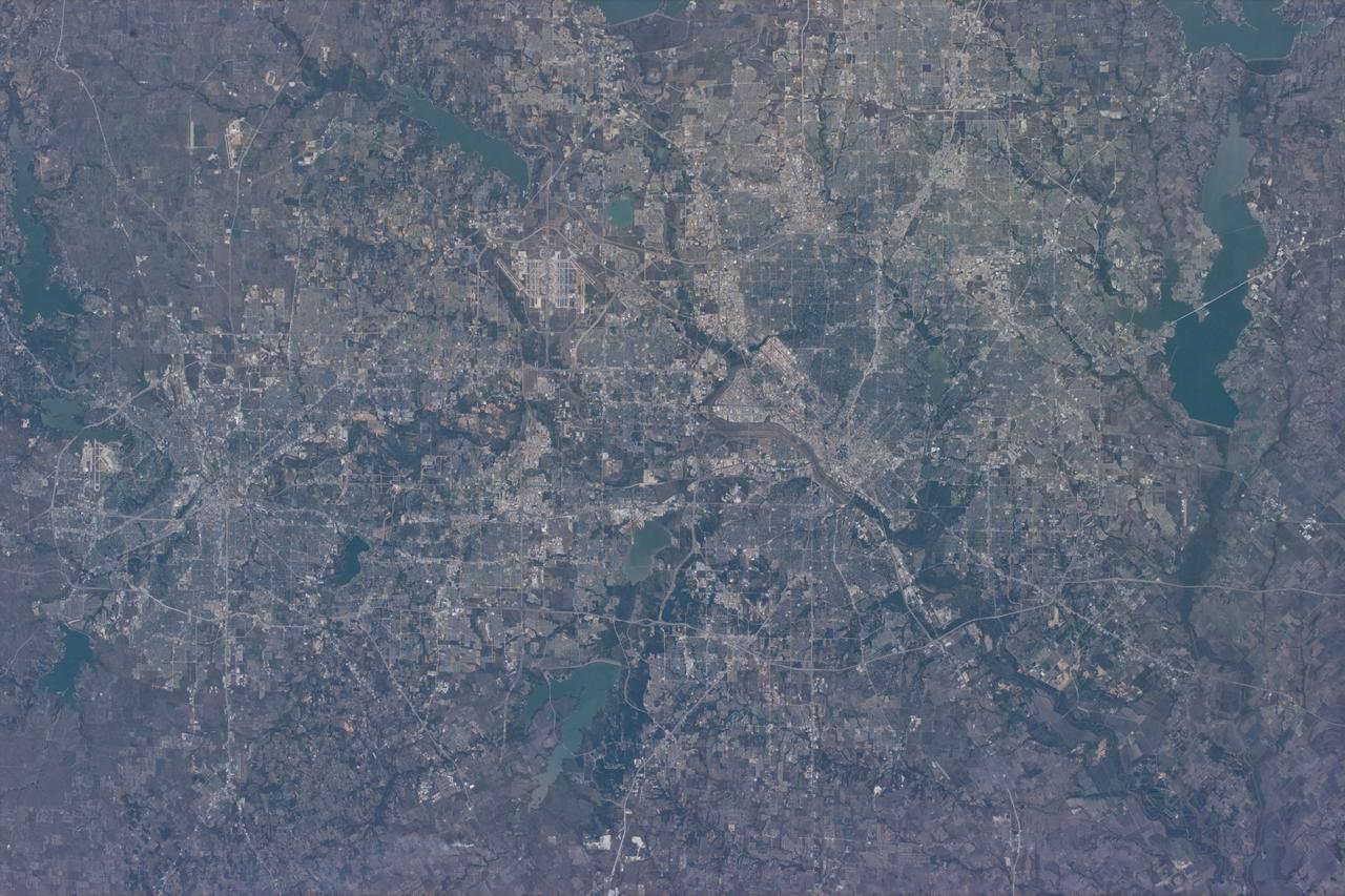 STS073-E-5071 (30 Oct. 1995) --- The Dallas-Ft. Worth metroplex is featured in this vertical view provided by an Electronic Still Camera (ESC) aboard the Earth-orbiting space shuttle Columbia. The area covers a range from Lake Benbrook on the left to Rockwall County (the state's smallest of 254 counties) on the right; and from a point just above Waxahachie on the south to Carrollton, north.