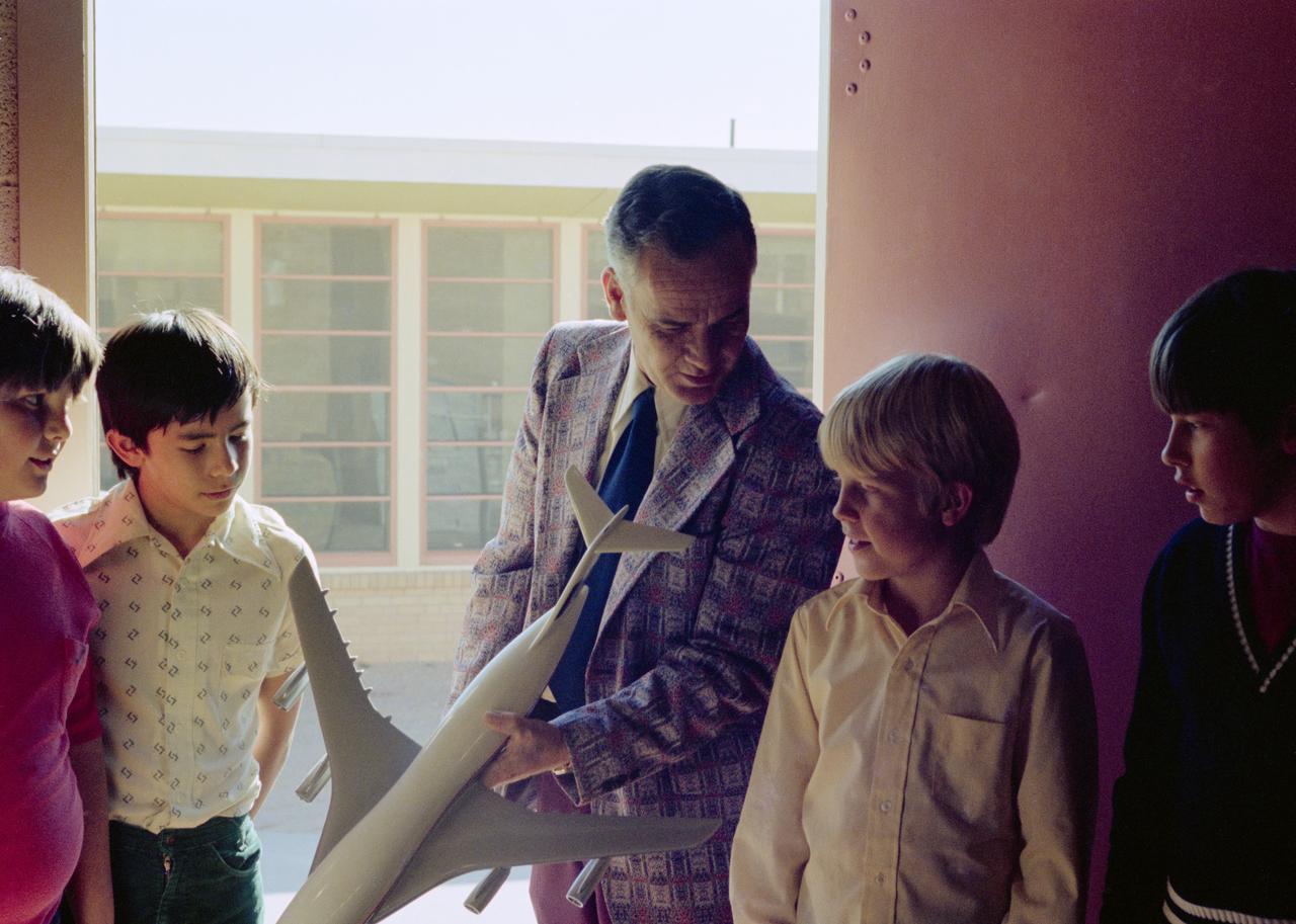 Photo documentation of NASA Public Affairs Office Personnel from Education Office and Public Information Office at Space Awareness lectures/demonstrations in San Antonio and El Paso, TX. Tom Hill, a Spacemobile lecturer, is seen in the view showing a model to children.