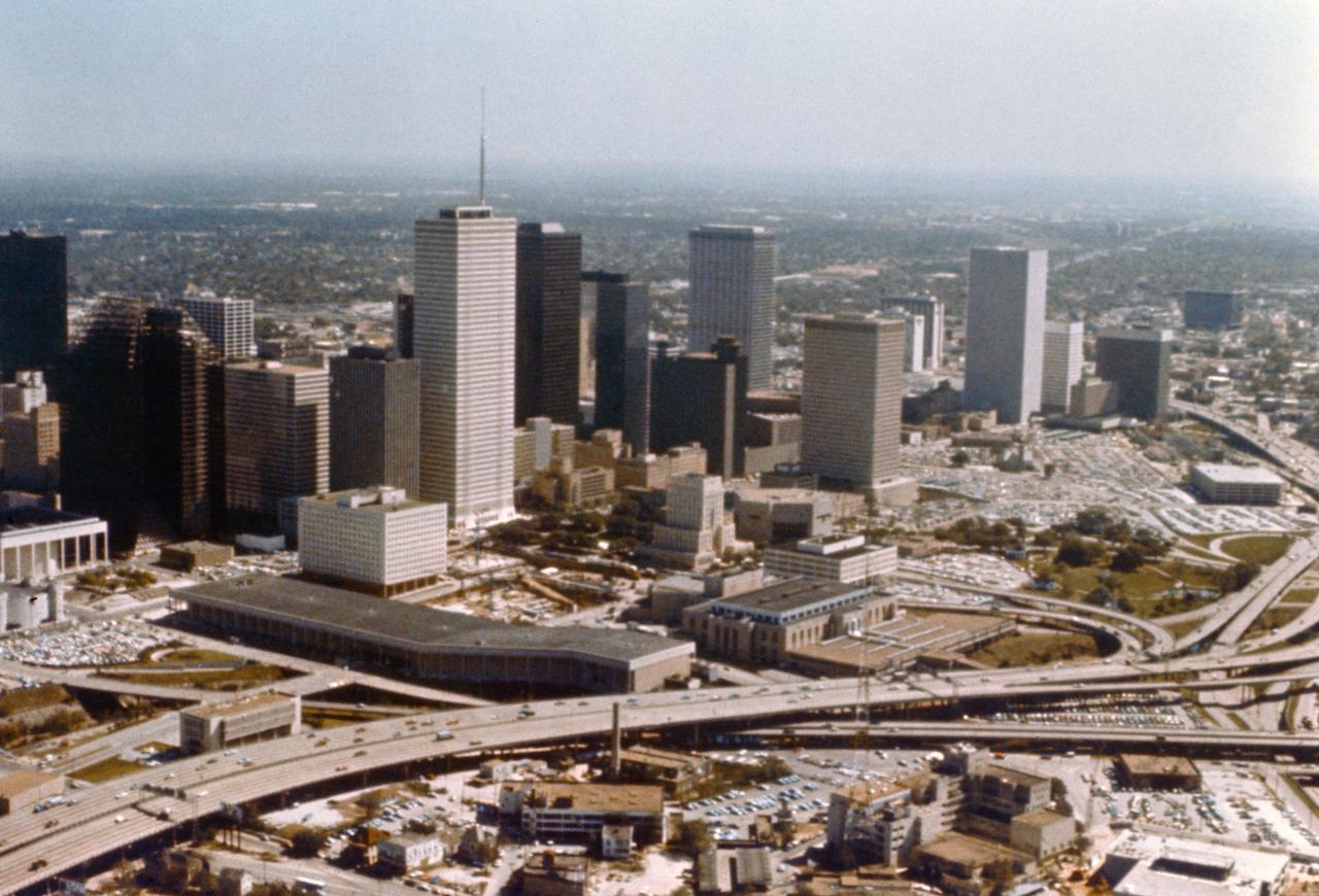Low-altitude, high-angle view of Houston downtown area. This view was photographed to show convention central part of downtown to promote facilities here for hosting large conventions, etc. 1. JSC PROTOCOL - CONVENTIONS HOUSTON, TX