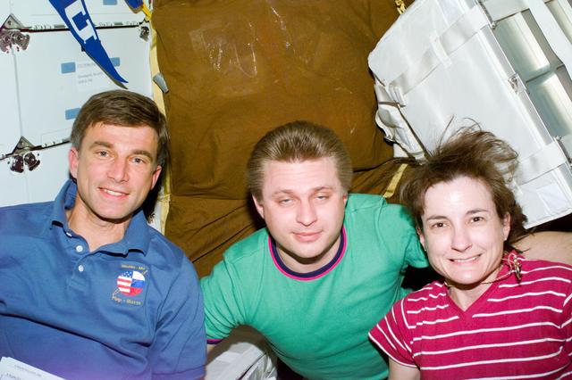 Crewmember activity in shuttle middeck and Mir Space Station