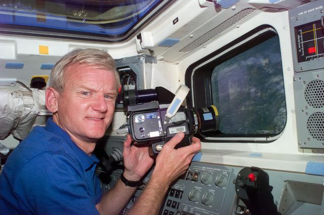 NASA image: Casper points camera out of aft flight deck window