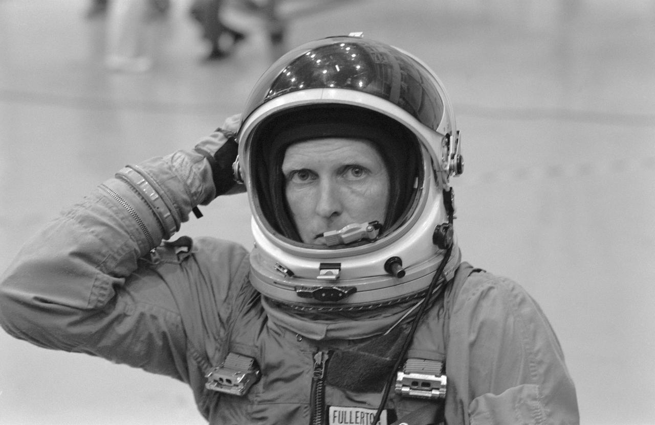 S78-34927 (31 Aug. 1978) --- Astronaut C. Gordon Fullerton, one of a group of eight astronauts named to fly the first few orbital flight tests of the space transportation system, gets ready to participate in a training session for emergency egress from a space shuttle vehicle at the launch pad. He is wearing a USAF modified high altitude pressure garment like those to be worn by shuttle crew members at takeoff and landing. Photo credit: NASA    NOTE:  Since this photograph was made, astronaut C. Gordon Fullerton was named pilot of STS-3, scheduled for launch in early spring of 1982.