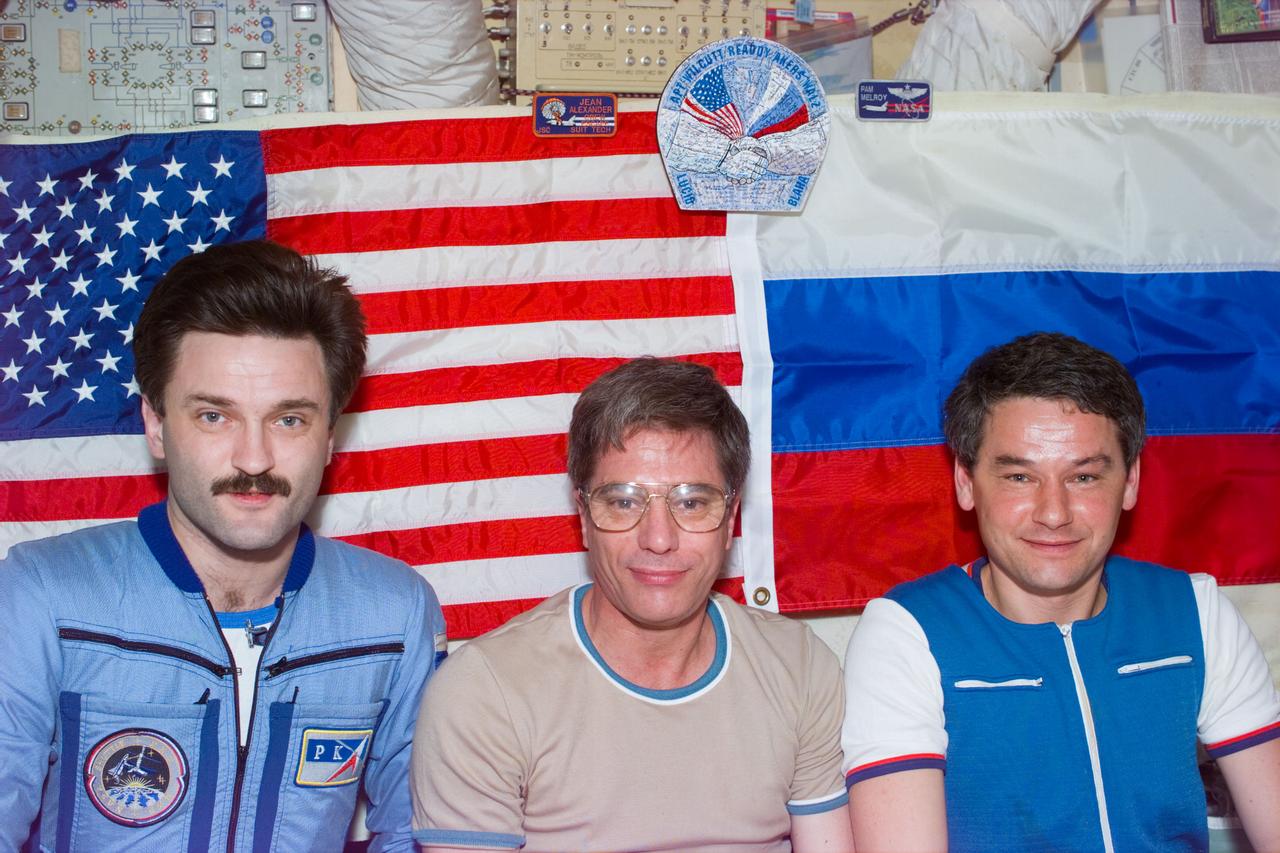 STS79-E-5294 (23 September 1996) --- Left to right, cosmonaut Aleksandr Y. Kaleri, Mir-22 flight engineer; astronaut John E. Blaha, cosmonaut guest researcher; and cosmonaut Valeri G. Korzun, Mir-22 commander, Mir-22 crew members in their final photo aboard Russia's Mir Space Station before bidding farewell to the STS-79 crew members, aboard the Space Shuttle Atlantis, during Flight Day 8. Soon after this Electronic Still Camera (ESC) view was recorded the STS-79 astronauts aboard Atlantis separated from the Mir.