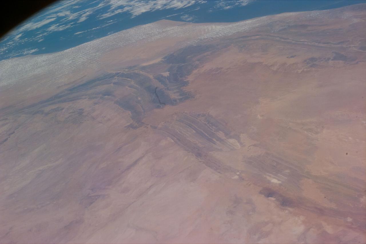 STS79-E-5385 (16 - 26 September 1996)   --- The Atlas Mountains, as seen from the Space Shuttle Atlantis, apparently have not changed much in 35 years of Earth observations from space as testified by astronaut Jerome (Jay) Apt, who took this picture with an Electronic Still Camera (ESC).  Astronaut John Glenn on NASA's MA-6 mission, took the first image of this area from space.