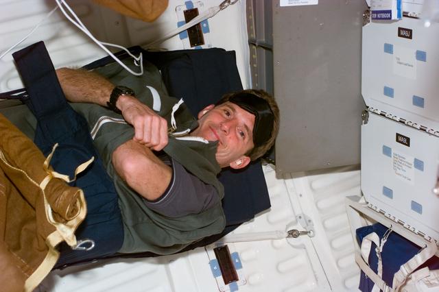 NASA image: MS Linenger in sleep restraint