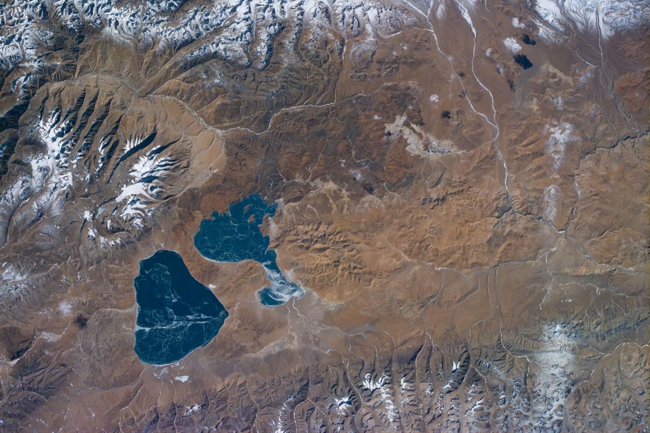 S81E5015 (13 January 1997) --- An Electronic Still Camera (ESC), mounted in the Space Shuttle Atlantis' aft flight deck overhead window, recorded this view of China, featuring two large lakes, Mapam Yumco and Langa Co. Once a year, NASA flies aboard its Shuttle fleet a student project called Kidsat, which enables students on Earth to have hands-on interface with Earth observations from a space perspective.