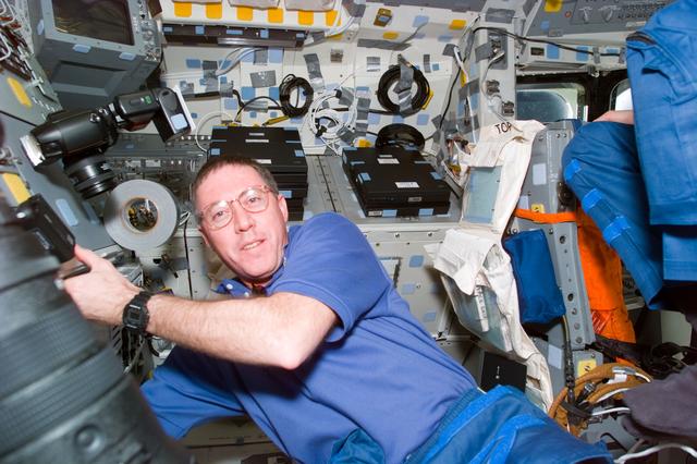 NASA image: Candid views of STS-81 commander and pilot on flight deck