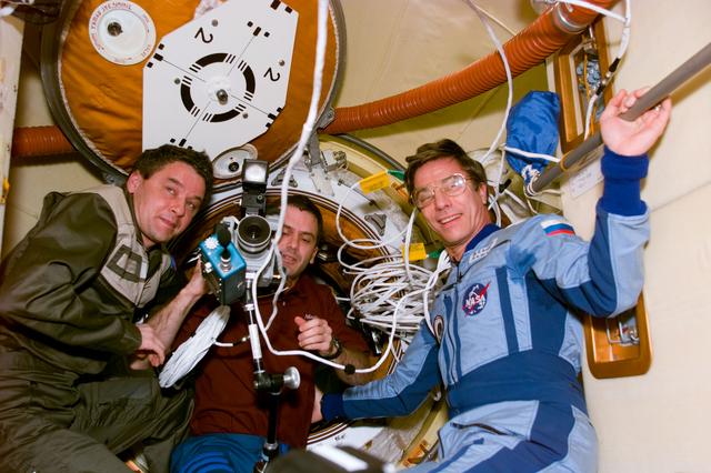NASA image: Mir 22 and STS-81 crews gather after rendezvous and docking