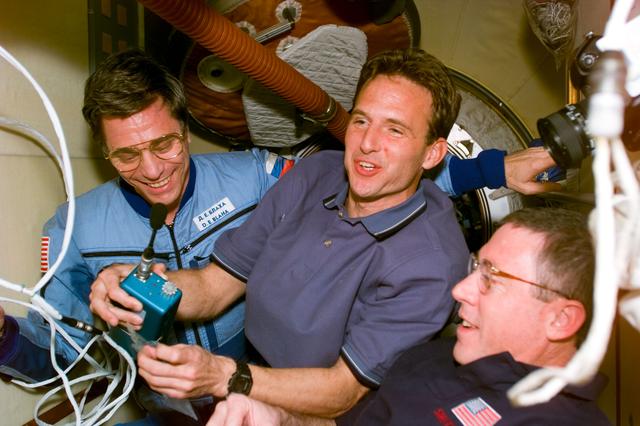 NASA image: Mir 22 and STS-81 crews gather after rendezvous and docking