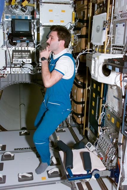 NASA image: Mir 22 flight engineer on the Spacehab module