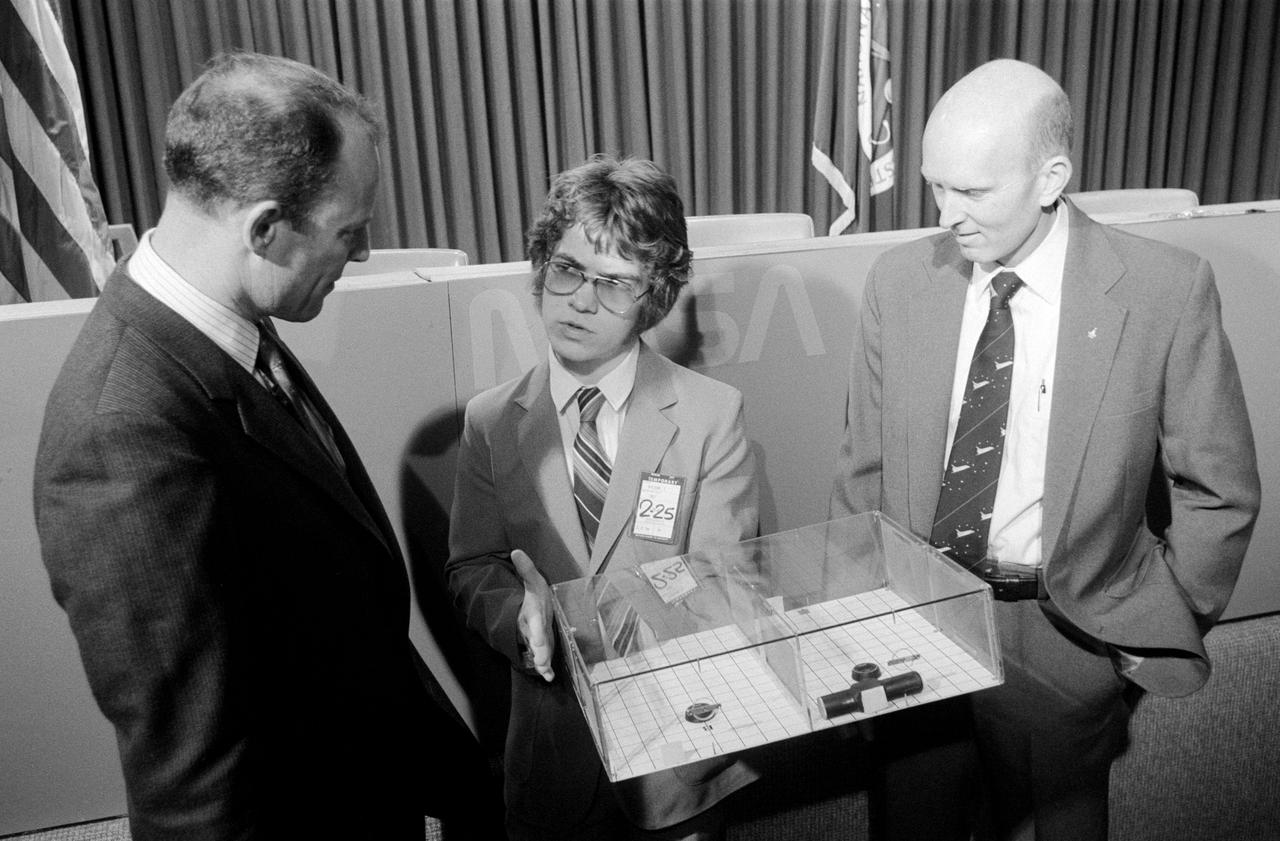 S82-27604 (26 Feb. 1982) --- The astronaut crew members for NASA?s third space transportation system (STS-3) flight meet with Todd E. Nelson, who devised a scientific experiment to fly on their mission. Astronauts Jack R. Lousma, left, commander, and C. Gordon Fullerton, pilot, along with the 18-year-old high school senior, discussed the experiment, entitled ?Insects in Flight Motion Study,? during a press briefing in JSC?s public affairs facility. Photo credit: NASA