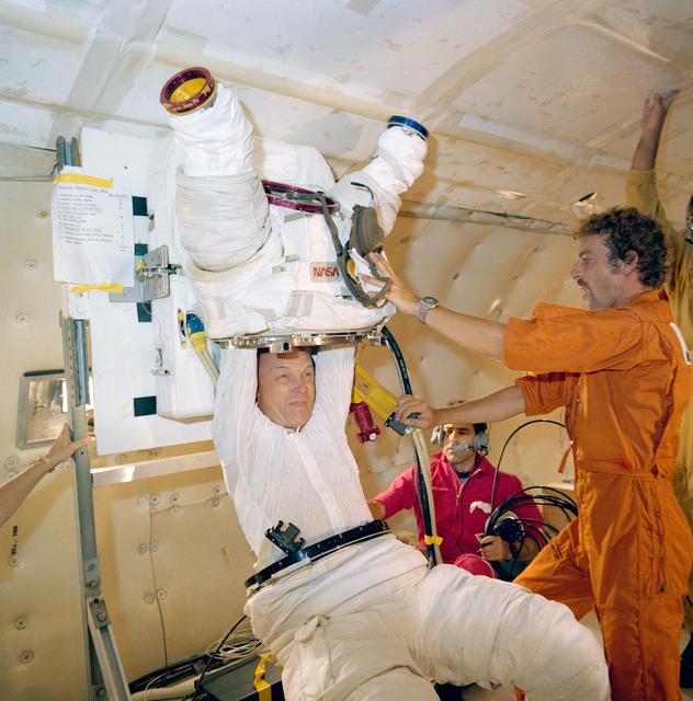 NASA image: Spacsuit donning and doffing in zero-g training for Story Musgrave STS-6