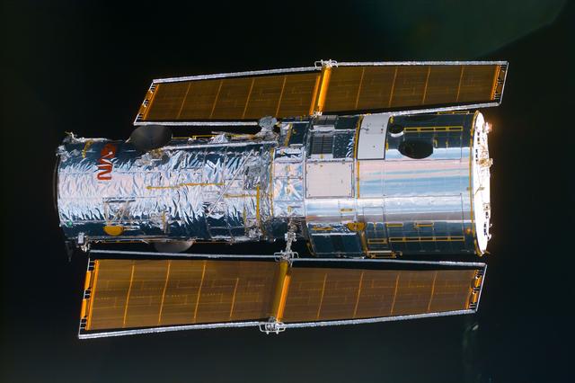 NASA image: HST,survey views of telescope surfaces during rendezvous and approach