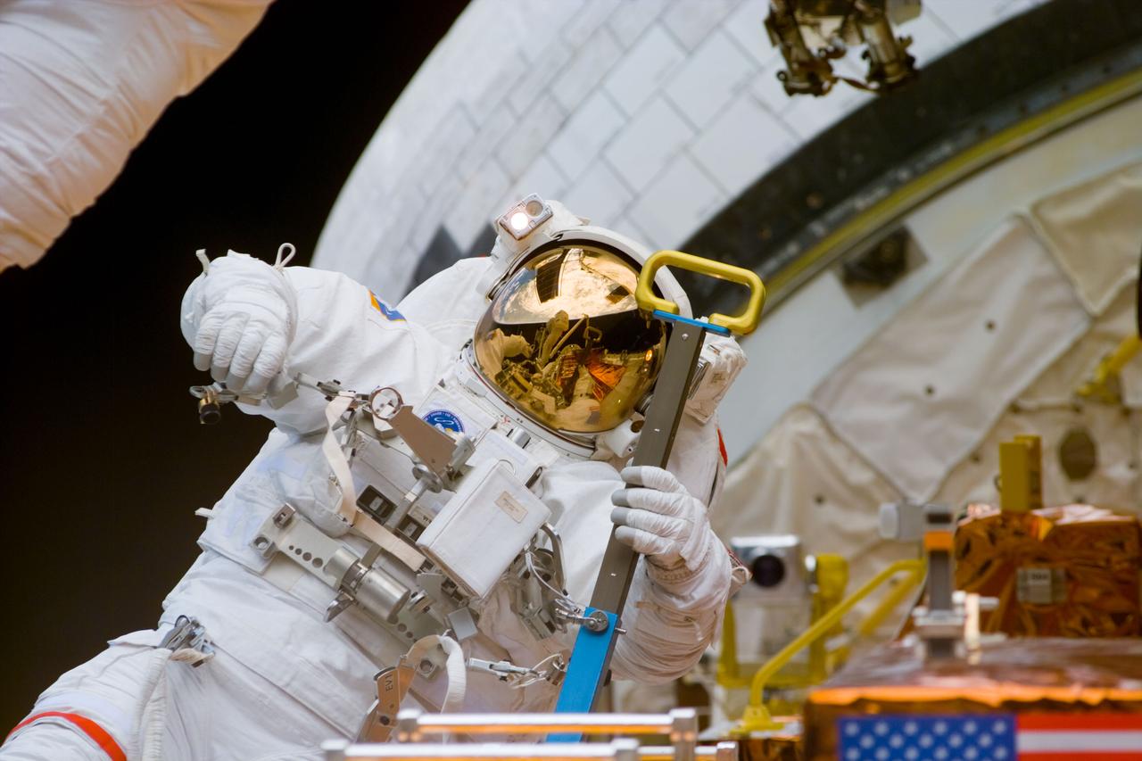 EVA 3 activity on Flight Day 6 to service the Hubble Space Telescope