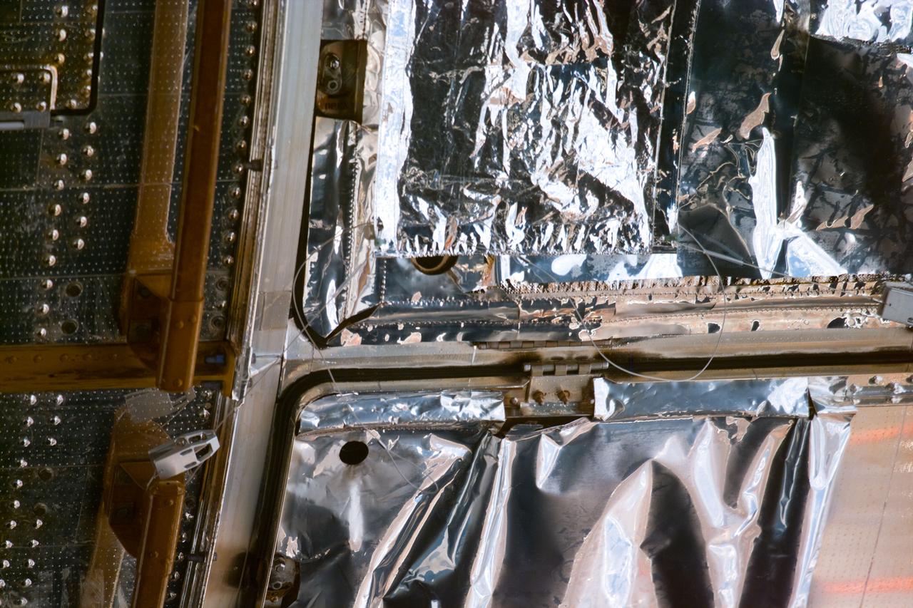 S82-E-5746 (18 Feb. 1997) --- Patch work for Bay #8 is visible at top (hold picture horizontally). This view was taken with an Electronic Still Camera (ESC).