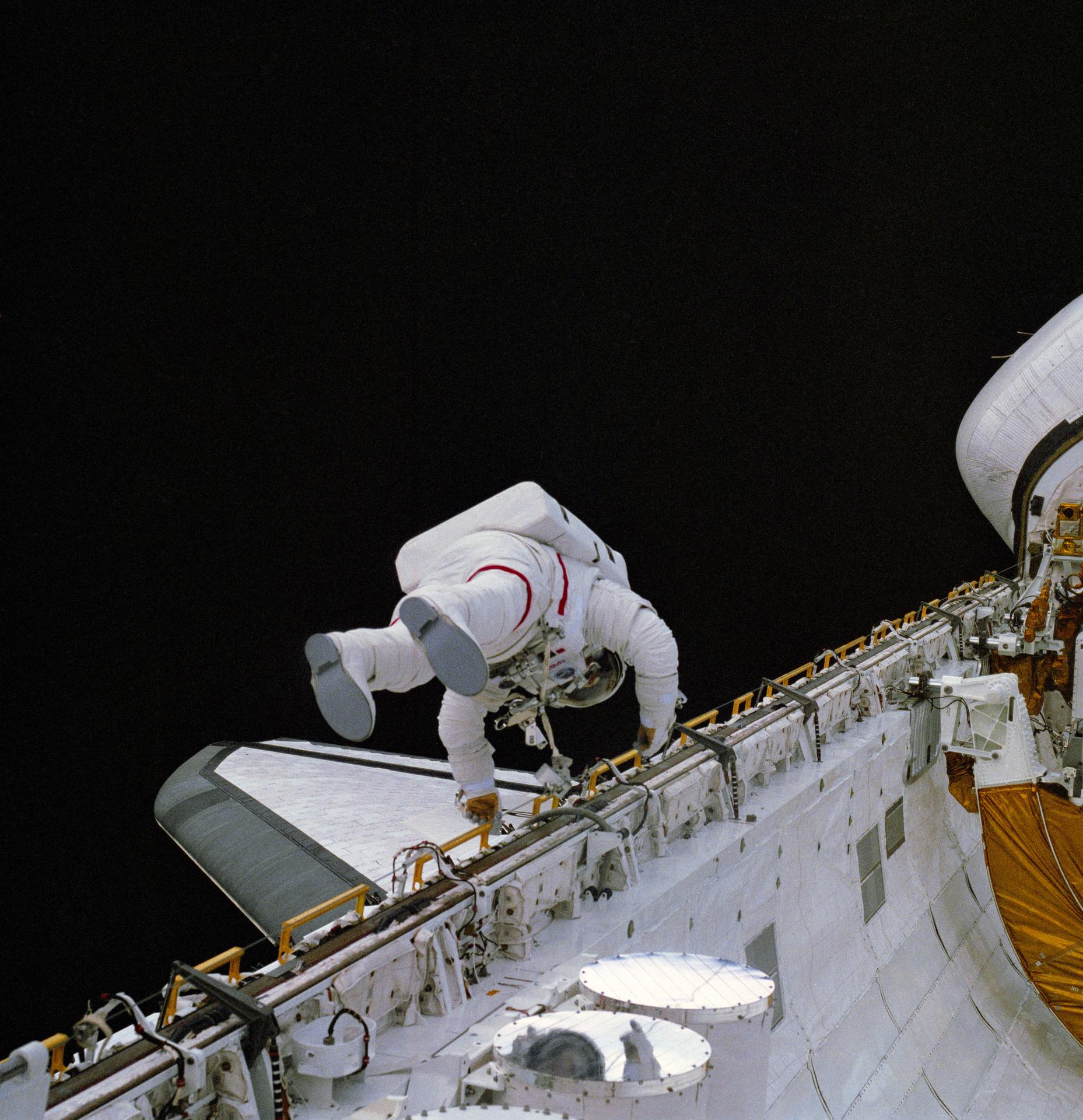 Story Musgrave, STS-6 on a spacewalk outside of the shuttle