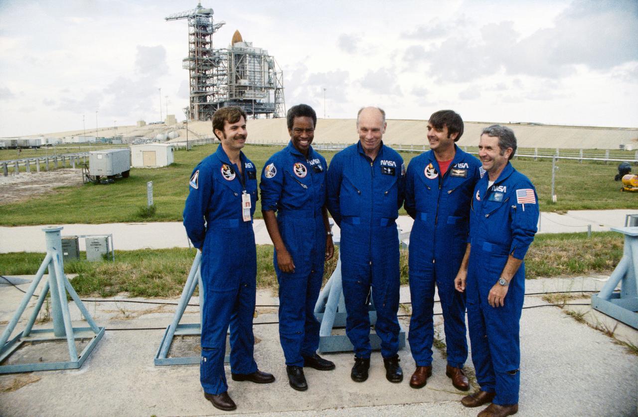 S83-38479 (16 Aug 1983) --- STS-8 crew poses at pad 39A at Kennedy Space Center (KSC) during a session with the news media. From left to right are Astronauts Dale A. Gardner, Guion S. Bluford, and Dr. William E. Thornton, all mission specialists; Daniel C. Brandenstein, pilot; and Richard F. Truly, crew commander.