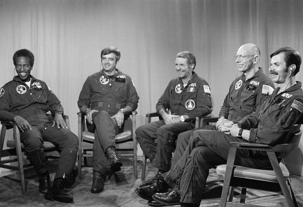 S83-39696 (5 Sept 1983) ---  The five member astronaut crew of the Space Shuttle Challenger for STS-8 responds to a comment made by President Ronald Reagan during a post flight telephone conversation with the chief executive. The five astronauts earlier today landed the reusable spacecraft at Edwards Air Force Base in California and were flown to JSC via NASA aircraft. Richard H. Truly, center, is crew commander. Pilot for the six day flight was Daniel C. Brandenstein, second left. The mission specialist were Guion S. Bluford, left: Dr. William S. Thornton, second right, and Dale A. Gardner, right. Photo credit: NASA