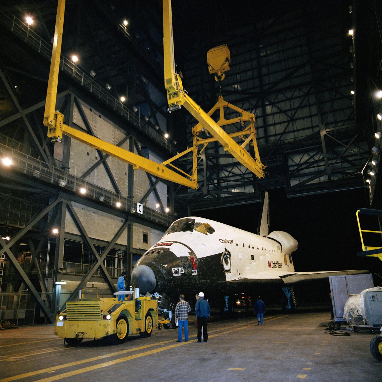S84-25872 (6 Jan 1984) --- Progress continues at the Kennedy Space Center (KSC) as the Space Shuttle Challenger is moved into the Vehicle Assembly Building (VAB) for mating to its two Solid Rocket Boosters (SRB) and External Fuel Tank (ET). The flight of STS-41B will carry five astronaut crew members into space for the performance of a variety of duties. Launch is scheduled for February 3, 1984.