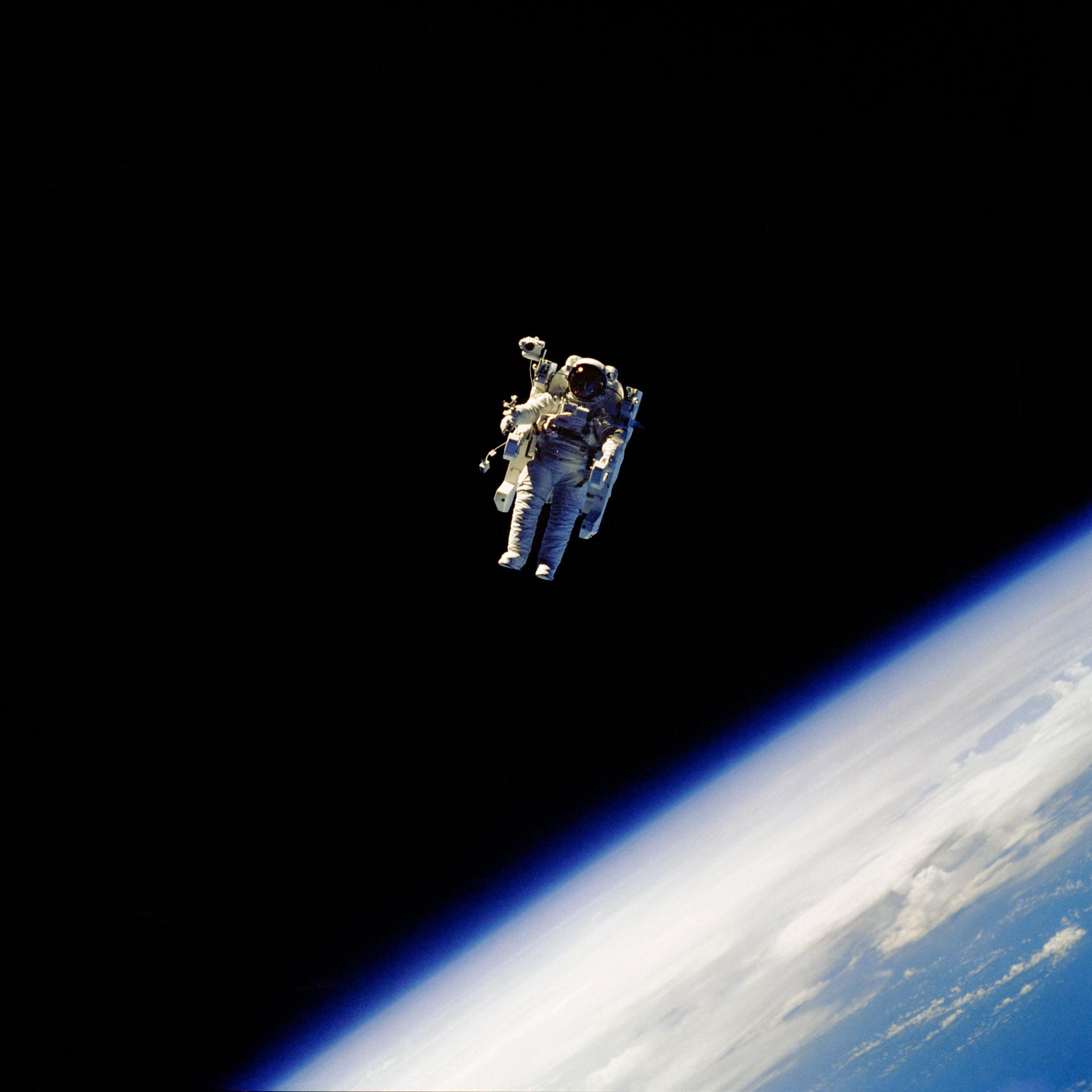 Robert L. Stewart floats untethered in Earth orbit during an EVA for STS-41B