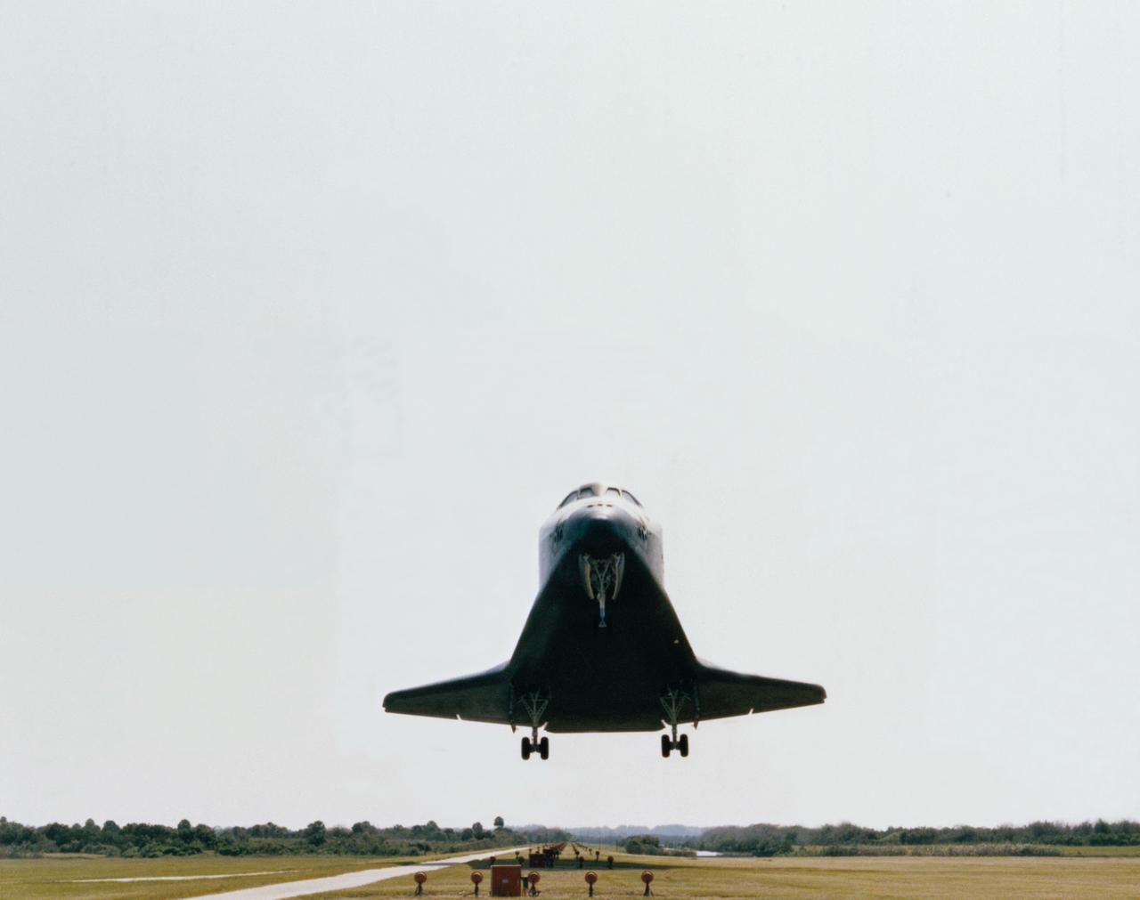 Landing of Orbiter Challenger at KSC completion of 41G Mission.   Views closeup front view of the Orbiter approaching the runway, its landing gear extended in preparation for touchdown. The KSC Alternative Photo Number is 108-KSC-84PC-639.      KSC, FL