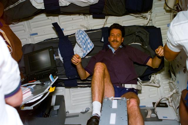 NASA image: Pilot Rominger exercises on the middeck ergometer