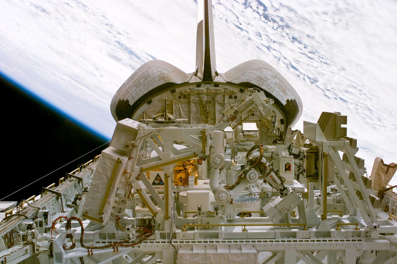 S85-E-5030 (10 August 1997) --- The Manipulator Flight Demonstration (MFD) in the Space Shuttle Discovery's cargo bay will evaluate the use of the Small Fine Arm (SFA) that is planned to be part of the future Japanese Experiment Module's Remote Manipulator System (RMS) on the International Space Station (ISS). The MFD is sponsored by the National Space Development Agency (NASDA).