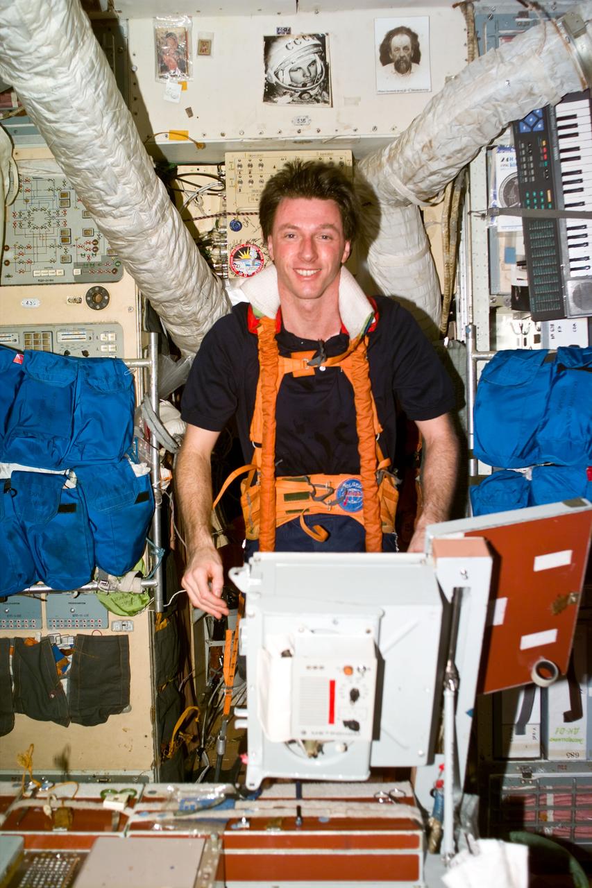 S86-E-5358 (30 Sept. 1997) --- This Electronic Still Camera (ESC) image shows astronaut C. Michael Foale, mission specialist and former cosmonaut guest researcher, exercising on the treadmill onboard the Russian Mir Space Station. Foale onboard Mir since mid-May 1997, has been replaced by astronaut David A. Wolf, during this seventh Atlantis/Mir docking mission. This view was taken at 17:30:40 GMT on Sept. 30, 1997.