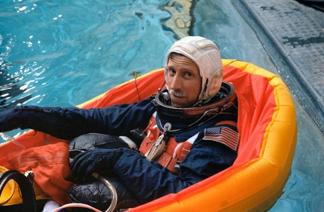 NASA image: STS-26 Pilot Covey floats in life raft during JSC WETF exercises