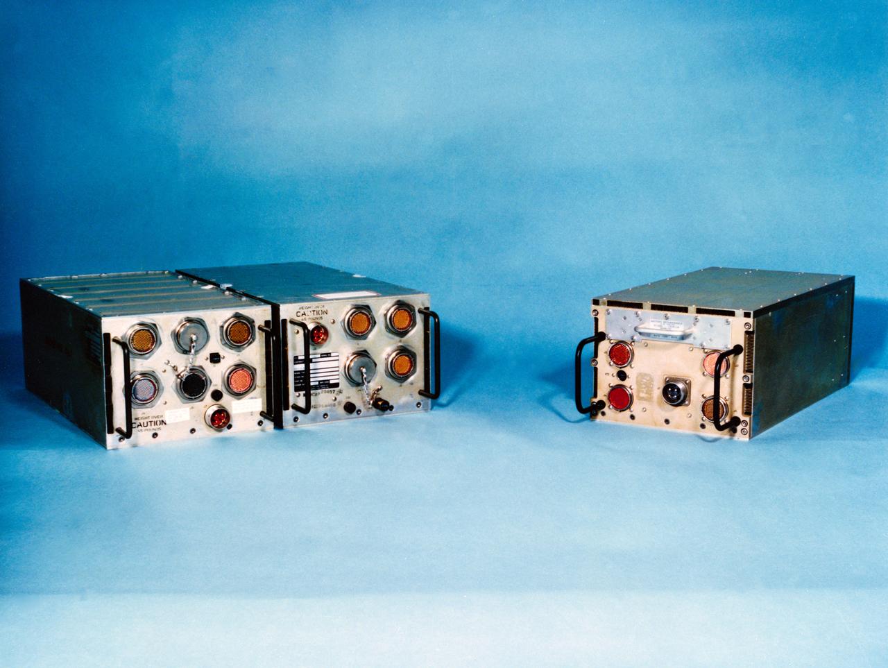 S88-47513 (Aug 1988) --- The current and future versions of general purpose computers for Space Shuttle orbiters are represented in this frame. The two boxes on the left (AP101B) represent the current GPC configuration, with the input-output processor at far left and the central processing unit at its side. The upgraded version combines both elements in a single unit (far right, AP101S).
