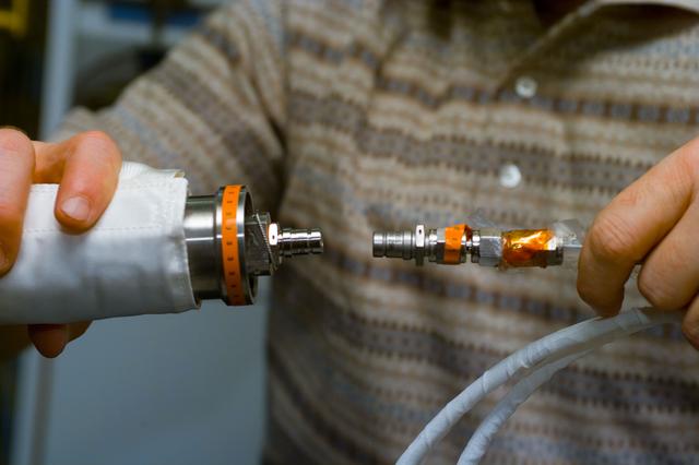 NASA image: Inflight maintenance of GIRA cable