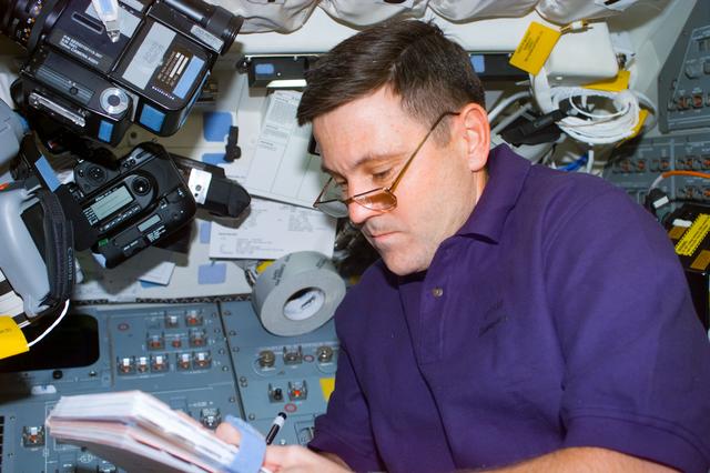 NASA image: Cabana on flight deck with checklist