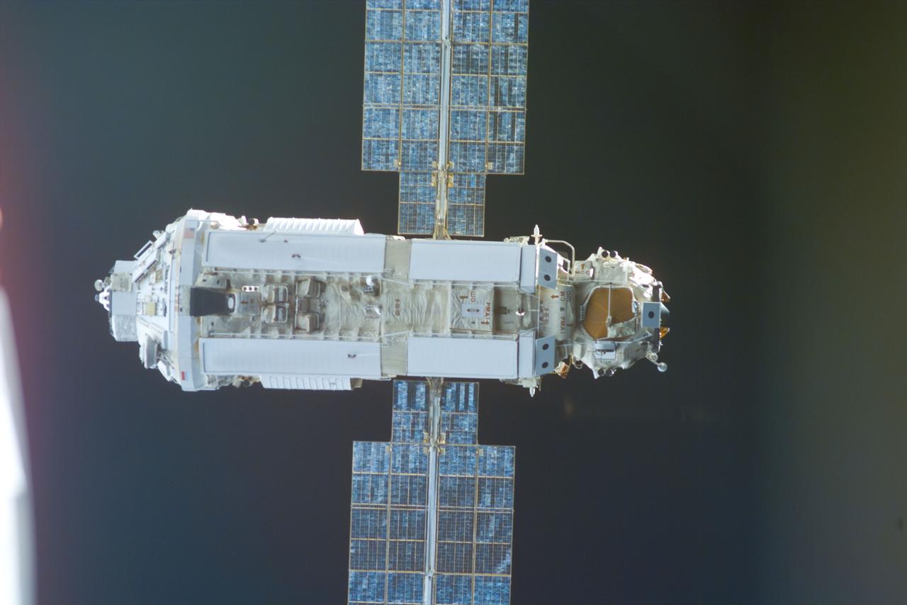 S88-E-5045 (12-06-98) --- With Endeavour's astronauts waiting to mate the Russian-built Zarya control module with the U.S.-built Unity connecting module, an electronic still camera (ESC) was used to record this image of the approaching Zarya. Using the shuttle's 50-ft.-long Canadian-built robot arm, astronaut Nancy J. Currie, working from Endeavour's aft flight deck, plucked Zarya out of orbit at 5:47 p.m. (CST), Dec. 6. The craft had been orbiting Earth for a little over 16 days prior to the grapple and subsequent docking to Unity. This image was recorded at 23:02:06 GMT, Dec. 6.