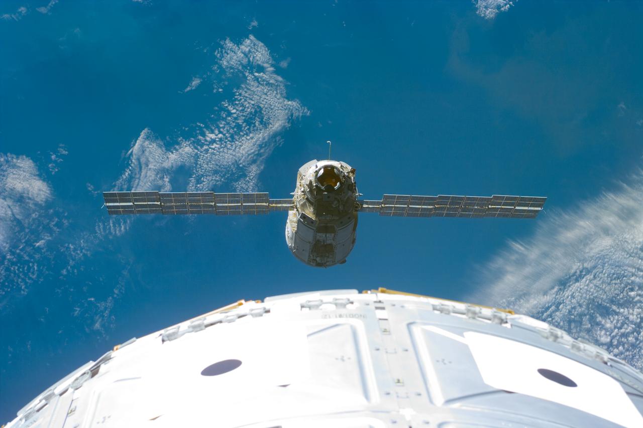 S88-E-5047 (12-06-98) --- With Endeavour's astronauts waiting to mate the Russian-built Zarya control module with the U.S.-built Unity connecting module, an electronic still camera (ESC) was used to record this image of the approaching Zarya. A portion of Unity is in the foreground. Using the shuttle's 50-ft.-long Canadian-built robot arm, astronaut Nancy J. Currie, working from Endeavour's aft flight deck, plucked Zarya out of orbit at 5:47 p.m. (CST), Dec. 6. The craft had been orbiting Earth for a little over 16 days prior to the grapple and subsequent docking to Unity. This image was recorded at 23:11:05 GMT, Dec. 6.