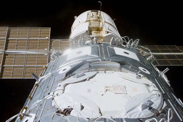 NASA image: View of the docked Node 1 and FGB modules with umbilical cables attached