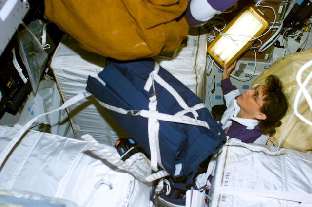 NASA image: Currie with stowage bags