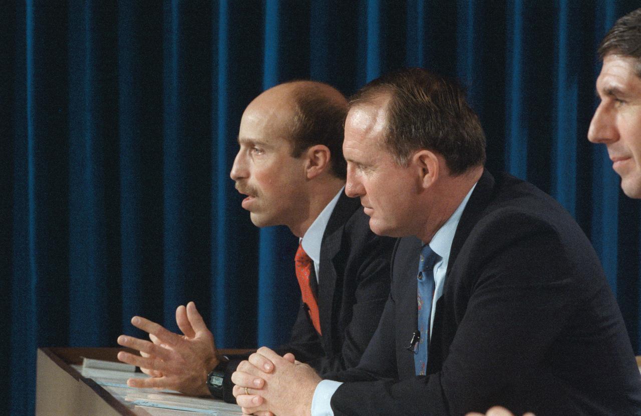 S89-25327 (11 Jan 1989) --- Two crewmembers for NASA's STS-29 mission ponder a question from a news reporter during a press conference concerning their scheduled mid-March flight.  James P. Bagian, at left, begins to answer the query, as James F. Buchli listens. Out of the frame are other members of the crew--Astronauts Michael L. Coats, mission commander; and John E. Blaha and Robert C. Springer.  The five will deploy a tracking and data relay satellite from Discovery's cargo bay as well as perform other important chores on their scheduled five-day flight.