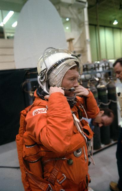 NASA image: STS-28 Columbia, OV-102, Pilot Richards adjusts LES before bailout exercises
