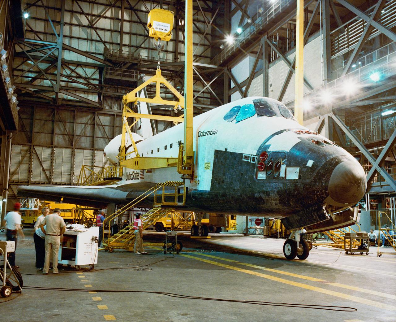 S89-39624 (3 July 1989) --- Following rollover from the Orbiter Processing Facility, the orbiter Columbia is prepared for mating with the ET/SRB stack in the Vehicle Assembly Building transfer aisle as work continues toward an early August launch of Space Shuttle Mission STS-28. STS-28 is a Department of Defense dedicated mission. Crew members for the mission are: Commander Brewster H. Shaw, Pilot Richard N. Richards, and Mission Specialists Mark N. Brown, James C. Adamson, and David C. Leestma.
