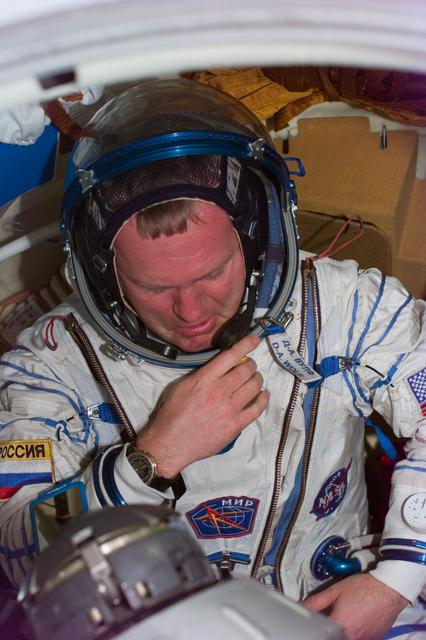 NASA image: MS Thomas wears a Sokol spacesuit on the Mir Space Station