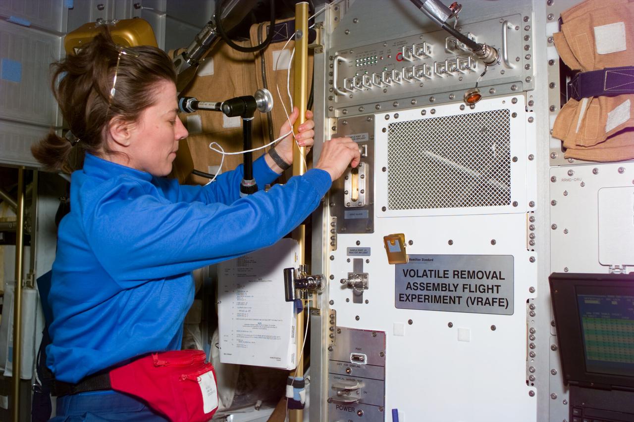 S89-E-5285 (25 Jan 1998) --- This Electronic Still Camera (ESC) image shows mission specialist Bonnie J. Dunbar, payload commander, working in the Spacehab Module onboard the Space Shuttle Endeavour.  Dunbar is working with RME-1326, a Risk Mitigation Experiment (RME) at the Volatile Removal Assembly (VRA).  This ESC view was taken on January 25, 1998 at 13:16:22 GMT.